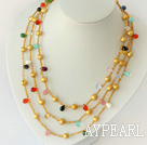 three strand dyed golden color pearl necklace