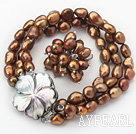 8-9mm Brown barokk Freshwater Pearl Set med Shell Flower Clasp (Strands armbånd og ring)