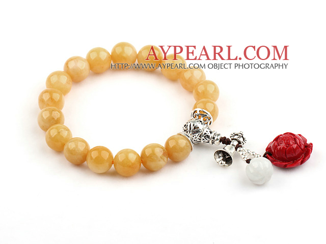 10mm Yellow Jade Stretch Armreif mit Kürbis Form Jade und Coral Lotus und Sterling Silber Zubehör