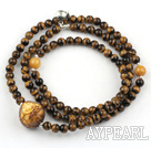 Tiger Eye Beaded Stretch Bracelet with Wax Buddha's Head and Yellow Jade and Sterling Silver Fish Accessory ( Can also be Necklace )