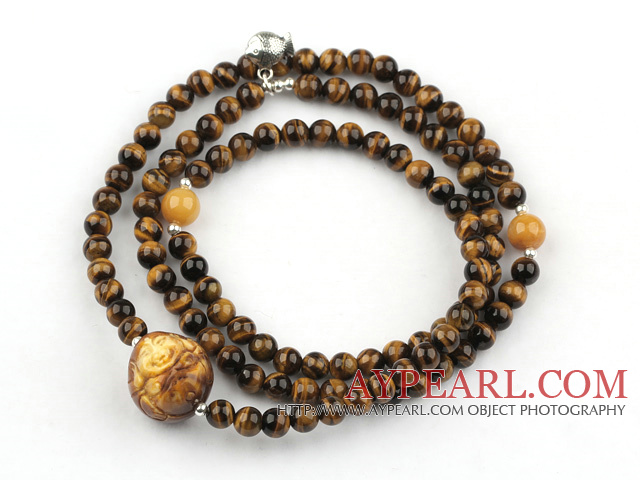 Tiger Eye Beaded Stretch Bracelet with Wax Buddha's Head and Yellow Jade and Sterling Silver Fish Accessory ( Can also be Necklace )