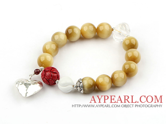 12mm A Grade goldene Farbe Tiger Eye Stretch Armreif mit Thailand Silver Heart Zubehör und Kürbis Form Kristall