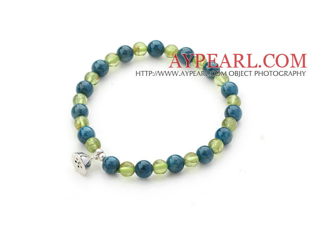 Single Strand Kyanit und Peridot Perlen Stretch-Armband mit Silber Lotus Seedpod Zubehör