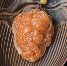 Un collier pendentif de jade de Huanglong année avec filetage Brown