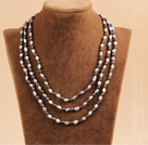 Snygg Elegant Long Style Natural Gray & Black Oblate Rice Pearl Party Halsband / tröja kedja