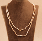 Snygg Elegant lång stil 5-6mm naturligt rosa Rice Pearl Party Halsband / tröja kedja