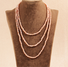 Stilig Elegant Long stil 4-5mm Natural Pink Freshwater Pearl partiet halskjede / genser Chain