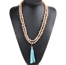 Fashion Hot Sale Potato Shape Natural Pink Pearl Long Necklace with Suede Leather Tassel (Tassel Can Be Removed)