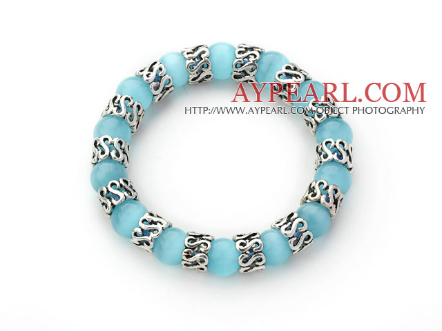 10mm Runda Ljusblå färg Cats Eye och Tibet Silver Spacer tillbehör ring Stretch Bracelet