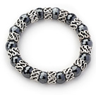 10mm Round fasettert svart hematitt og Tibet Silver Spacer Ring Tilbehør Stretch Bracelet