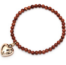 beautiful round goldstone and tibet silver peach heart charm beaded bracelet