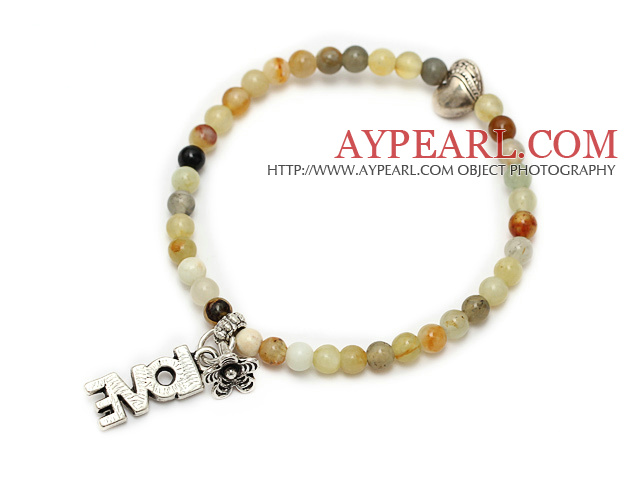trevlig runda serpentin jade och Tibet silver hjärta blomma charm pärlstav armband