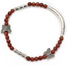 eleganten runden goldstone und Tibet Silber Schmetterling Rohr Charme Armband