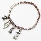 Wholesale nice round gray agate and tibet silver leaf lucky bag and tube charm bracelet