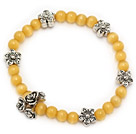 Wholesale beautiful yellow round cats eye and tibet silver flower charm beaded bracelet