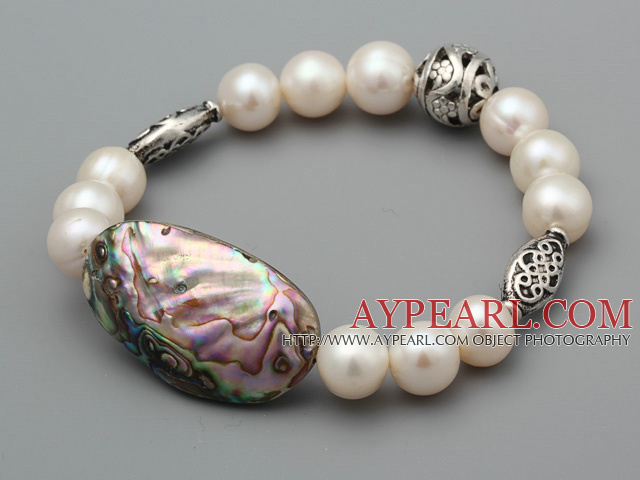 Vackra A Grade Natural White Freshwater Pearl och Abalone Shell armband med boll Charms