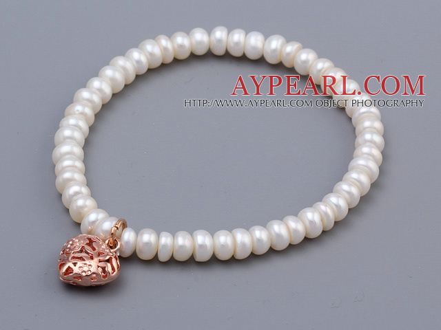 Mode 5 - 6mm Natural White Abacus Shape Freshwater Pearl pärlstav armband med Rose Golden Hollow Heart Charm