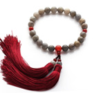 Nyligen Mode Single Strand runda Blinkande Sten och Carnelian Holding Radband med Red Tassel