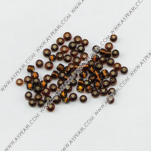 Glass seed beads, silver-lined brown, 2.5mm round. Sold per pkg of 450 grams.