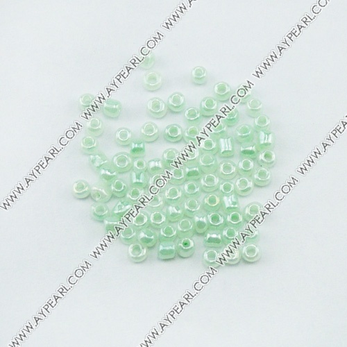 Glass seed beads, ceylon blue, 2.5mm round. Sold per pkg of 450 grams.