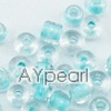 Glass seed beads, transparent inside blue, 2.5mm round. Sold per pkg of 450 grams.