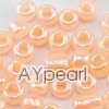 Glass seed beads, ceylon orange, 2.5mm round. Sold per pkg of 450 grams.