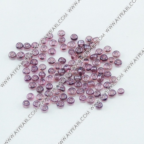 Glass seed beads, transparent lustered purple, 2.5mm round. Sold per pkg of 450 grams.