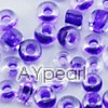 Glass seed beads,transparent inside purple, 4.5mm round. Sold per pkg of 450 grams.