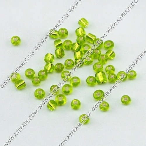 Glass seed beads, silver-lined green, 4.5mm round. Sold per pkg of 450 grams.