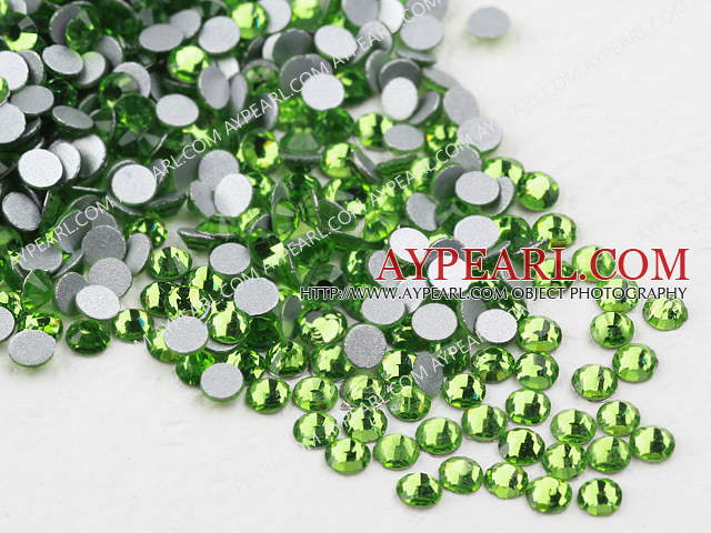 Rhinestone cabochon, light green, silver-foil back ,3.0-3.2mm faceted round, SS12. Sold per pkg of 1440.