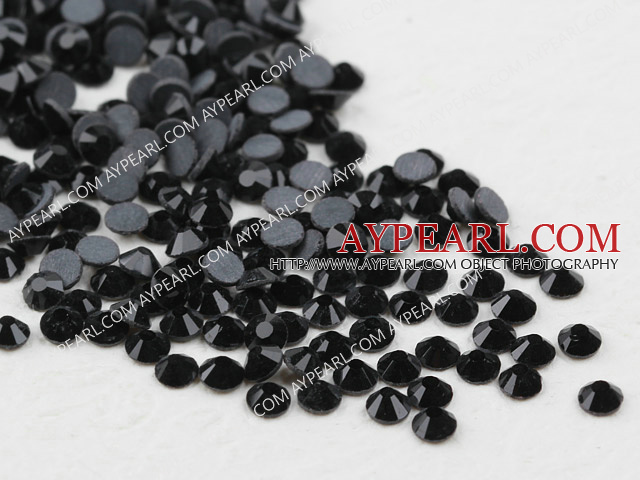 Rhinestone cabochon, black, silver-foil back ,3.0-3.2mm faceted round, SS12. Sold per pkg of 1440.