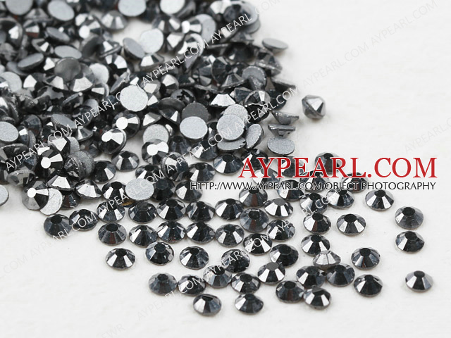 Rhinestone cabochon, grey, silver-foil back ,3.0-3.2mm faceted round, SS12. Sold per pkg of 1440.