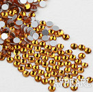 Rhinestone cabochon, golden, silver-foil back ,3.0-3.2mm faceted round, SS12. Sold per pkg of 1440.