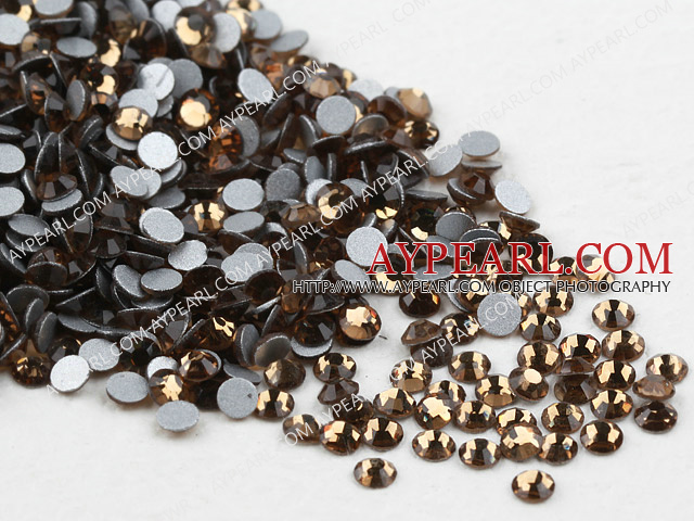 Rhinestone cabochon, brown, silver-foil back ,3.0-3.2mm faceted round, SS12. Sold per pkg of 1440.