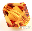 Austrain crystal beads, golden champagne color, 6mm bicone. Sold per pkg of 360.