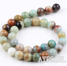 Multi color amazon stone beads, 12mm round. Sold per 15.16-inch strand.