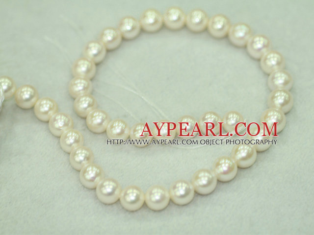 Freshwater pearl beads, white, 11-12mm round. A grade. Sold per 15.7-inch strand.