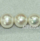 Freshwater pearl beads, white color, 12-14mm round. A grade. Sold per 15.7-inch strand.