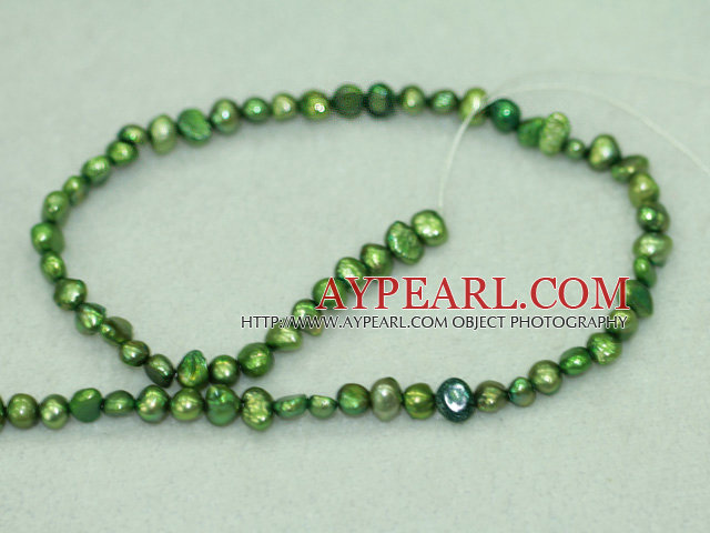 Freshwater pearl beads, dyed green, 5-6mm potato. Sold per 14-inch strand.