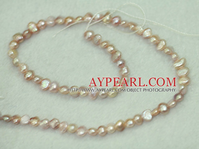 Freshwater pearl beads, dyed pink, 5-6mm potato. Sold per 14-inch strand.