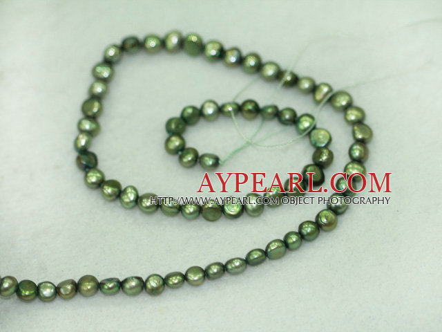 Freshwater pearl beads, dyed green, 5-6mm potato. Sold per 14-inch strand.