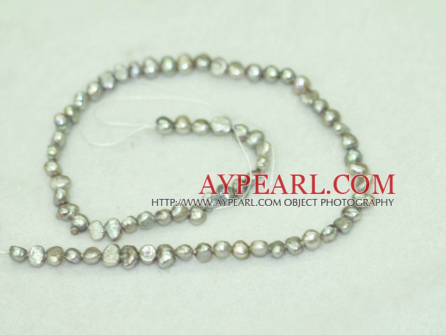 Freshwater pearl beads, dyed grey, 5-6mm potato. Sold per 14-inch strand.