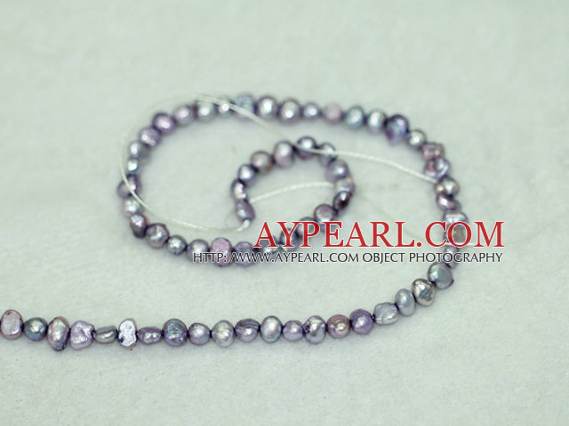 Freshwater pearl beads, dyed purple, 5-6mm potato. Sold per 14-inch strand.