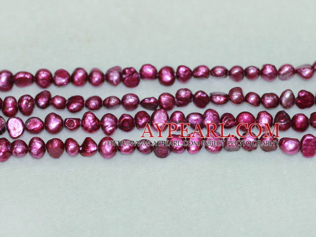 Freshwater pearl beads, dyed red, 5-6mm potato. Sold per 14-inch strand.