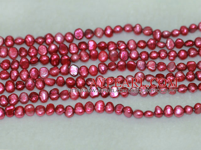 Freshwater pearl beads, dyed red, 5-6mm potato. Sold per 14-inch strand.