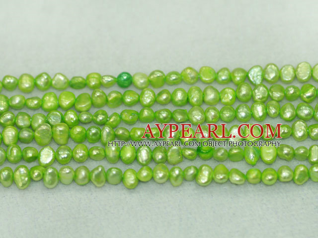 Freshwater pearl beads, dyed green, 5-6mm potato. Sold per 14-inch strand.