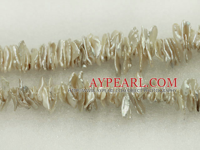 Biwa freshwater pearl beads, 5*10*18mm keshi. Sold per 15inch strand.