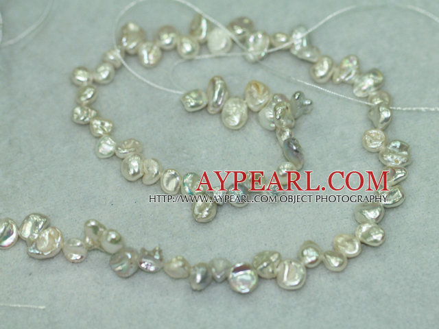 Freashwater pearl beads, white,  5*7*9mm top-drilled keshi. Sold per 15.4-inch strand.