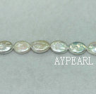 Freshwater pearl beads, white, 10-11mm oval coin. Sold per 14.8-inch strand.