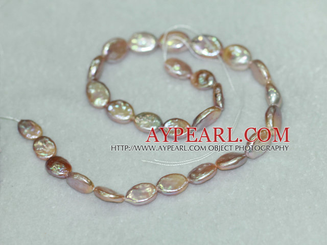 Freshwater pearl beads, purple, 10-11mm oval coin. Sold per 14.8-inch strand.